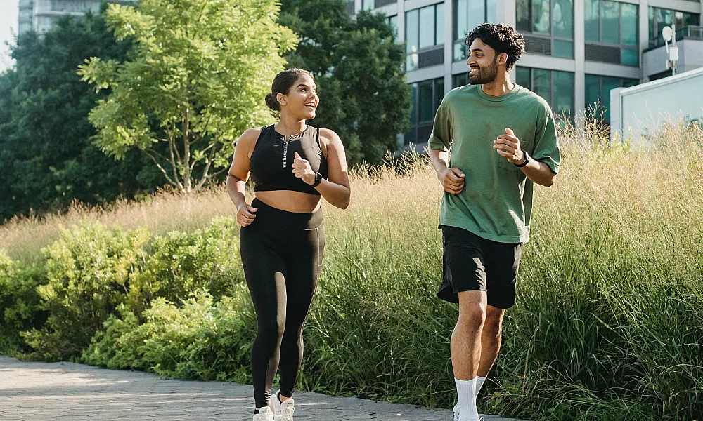 couple running together outdoors