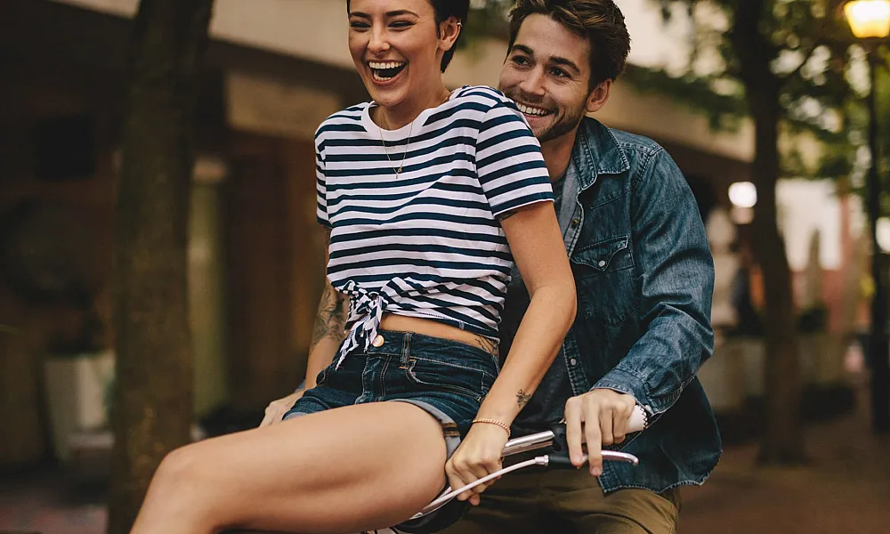 girl and guy on bike