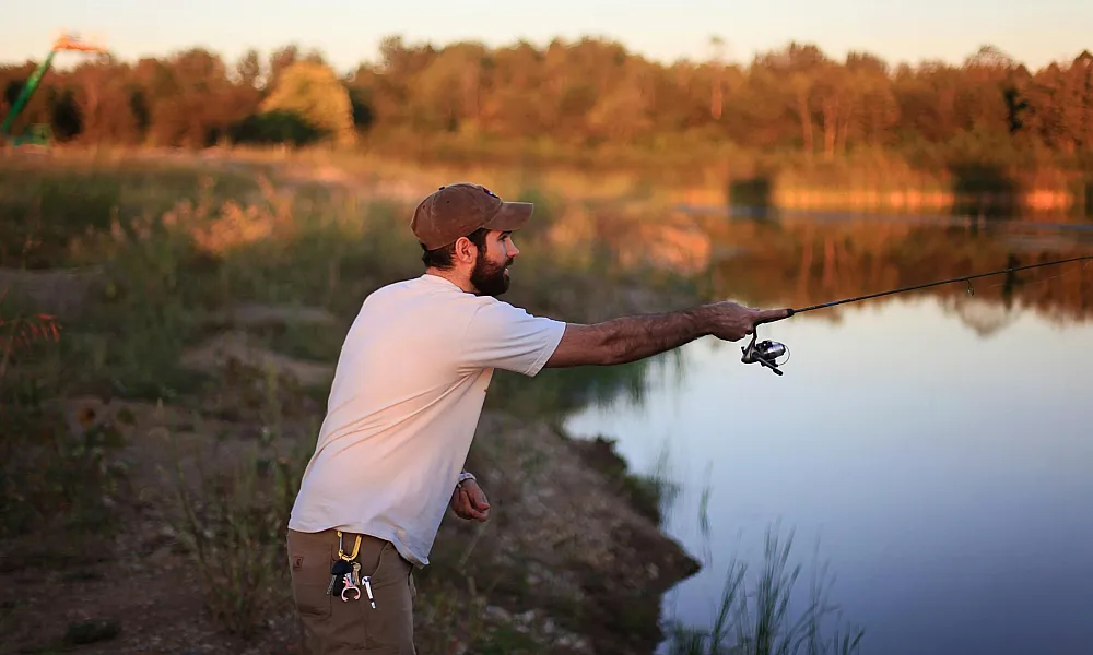 man in a hat fishing