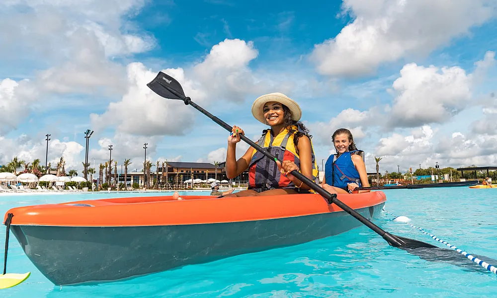 two girls kayaking