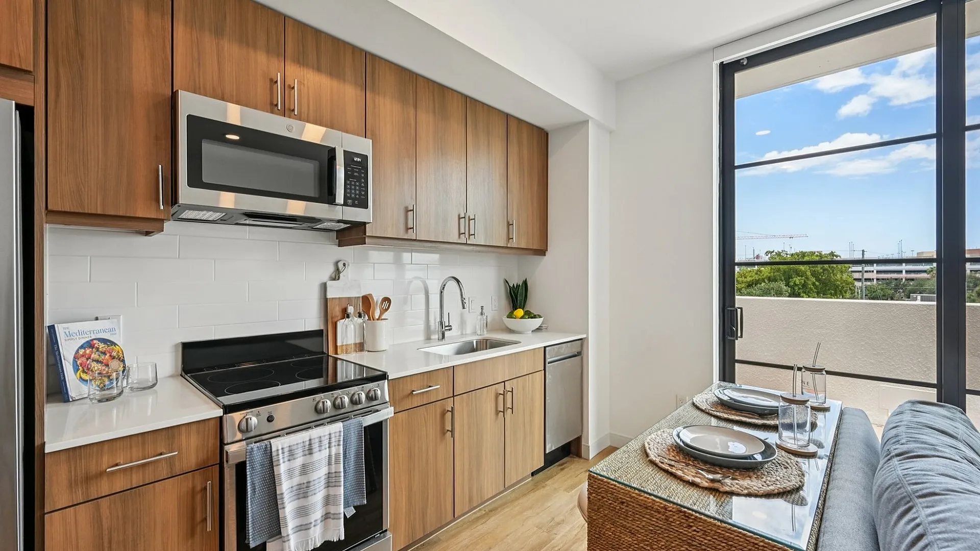 Studio kitchen with wood cabinets