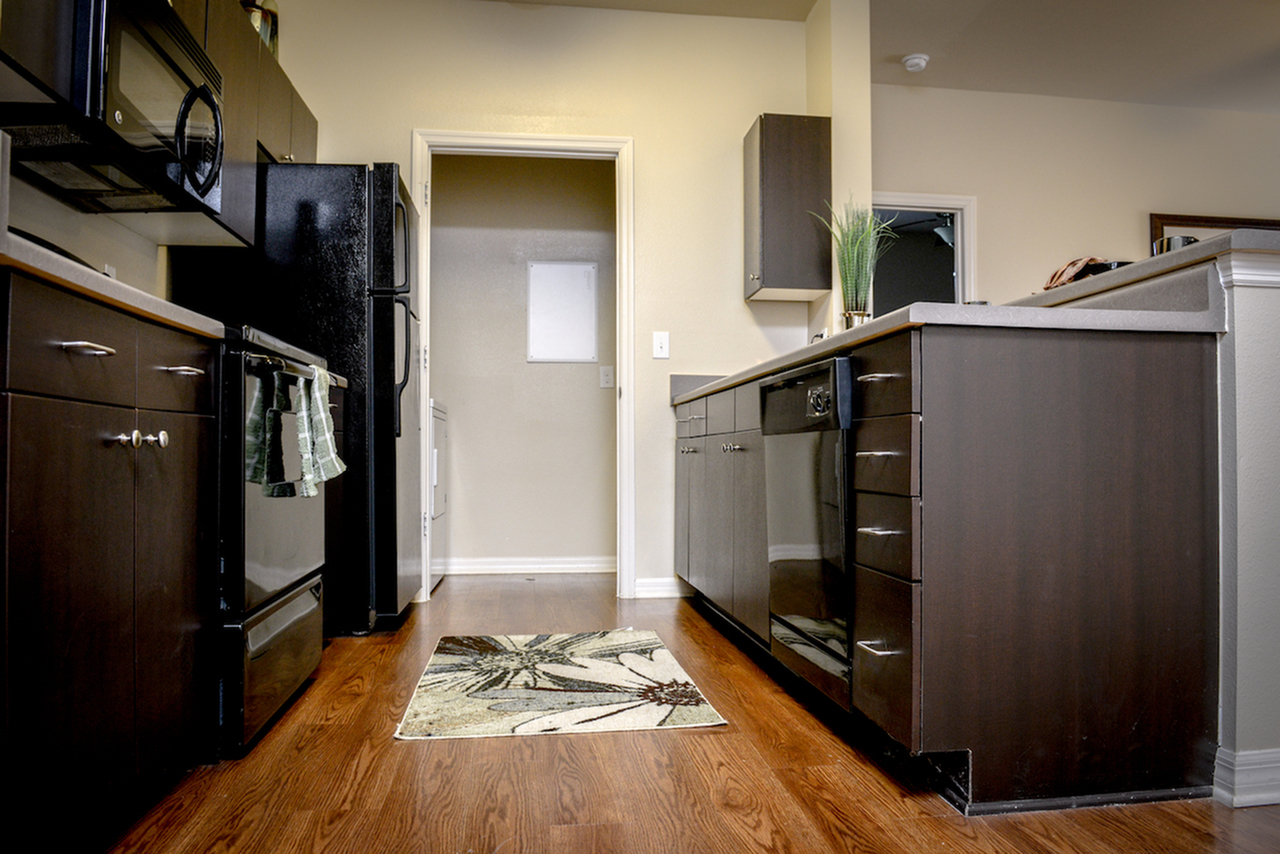 Image of Dark Wood Cabinetry for Independence Place West Fayetteville
