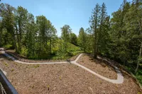 Walking trails along the creek and wetland views.