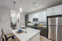 Furnished kitchen with large island