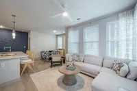 Furnished living room with couch and coffee table