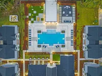 Aerial view of commuity and pool