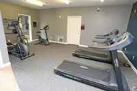 The Reserve's gym includes cardio and strength-building equipment.