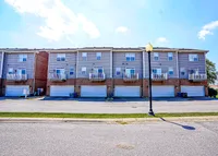 The Reserve's townhomes include attached garages on the lower levels.