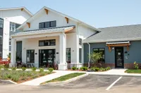 The Nese Apartments clubhouse includes the Leasing Office, resident lounge and game room, package center, conference room,WFH stations, a coffee bar. and fitness center.