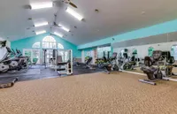 The 24-hour fitness center includes cardio and strength-building equipment.