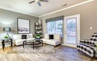 Large living rooms with natural light are among the apartment features.