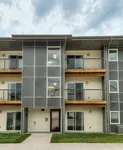 Discover the modern, three-story design of Legacy Landing Apartments—complete with private balconies and stylish curb appeal.