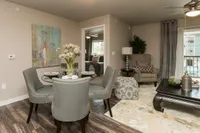 Make it yours—this spacious open layout offers plenty of room for dining, relaxing, and easy access to your private bedroom.