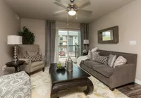 Bright and airy living spaces open directly to your private balcony—bringing in natural light and outdoor charm.