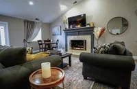 The clubhouse at Hamilton Station feels like an extension of home—with a cozy fireplace, soft seating, and a full kitchen nearby, it’s the perfect spot to relax or host.