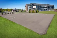 Pick-up games are just steps away with a full outdoor basketball court right in the neighborhood.