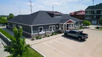 Stop by the clubhouse to grab a coffee, say hello, or get the info you need — our team’s here and ready to help. Inviting leasing center with modern architecture, surrounded by lush greenery and convenient parking.