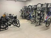 Modern apartment bicycle storage with organized racks for convenient and secure bike parking.