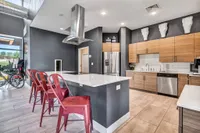 The Kinsley Forest clubhouse is available for resident use, including a full kitchen and coffee bar.