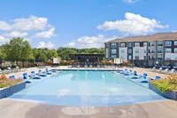 Our pool features a fountain and in-water sundeck to cool off during the summer months.