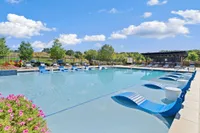 The resort-style fool features an in-water lounge ledge.