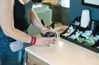 The clubhouse includes a complementary coffee station for residents.