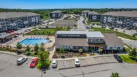 Community amenities include a resident clubhouse, resort-style pool, outdoor kitchen, hammock courtyard, and dog park.