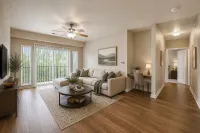 Spacious living room with luxury vinyl flooring.