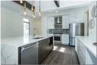 Gourmet Kitchens with Waterfall Countertop