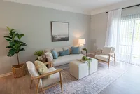 Living Room with Walk Out Patios