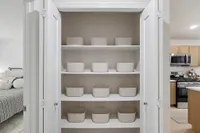 Spacious pantry with built-in shelving
