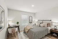 Spacious guest bedroom with room for a home office