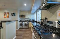 Sleek appliances and in-unit laundry