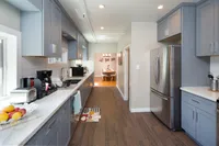 Renovated kitchen featuring sleek appliances