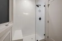 Spacious walk in shower with beautiful glass door