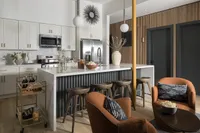 Living room with modern and contemporary furnishings.