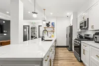 Modern kitchen space with marble tabletops