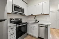 Modern kitchen equipped with sleek stainless steel appliances