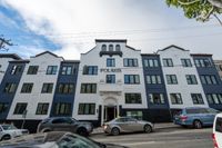 Charming historic building exterior with elegant architectural details and modern finishes, ideal urban living setting.