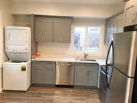 Unit #8 Kitchen & Laundry Area