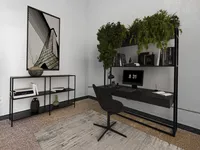 Modern home office with sleek black furniture, lush greenery, and stylish decor, featuring a minimalist desk, computer setup, and artistic wall design.