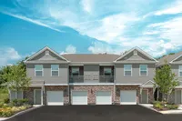 Experience the perfect combination of style, comfort, and functionality in a home designed for modern living. Stylish townhome with modern exterior, featuring garage and quaint balcony.