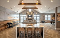 Experience premium living in our clubhouse lounge, perfect for relaxation and entertainment. Luxurious open-concept living space with high vaulted ceilings, modern lighting, and stylish decor, featuring a central fireplace and expansive windows for natural light.