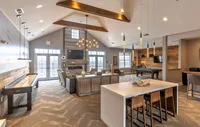 Experience premium living in our clubhouse lounge, perfect for relaxation and entertainment. Luxurious open-concept lounge featuring modern lighting, elegant seating, and a stylish pool table, perfect for entertaining.