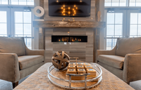 Experience premium living in our clubhouse lounge, perfect for relaxation and entertainment. Inviting living space with plush seating, a sleek wooden coffee table, and a modern gas fireplace, exuding warmth and elegance.