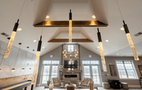 Experience premium living in our clubhouse lounge, perfect for relaxation and entertainment. Elegant apartment living room with modern chandelier, cozy seating, and large windows for natural light.