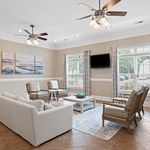 Experience comfort in this elegantly designed living room, perfect for relaxation and entertaining.