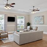 Experience comfort and style in this beautifully designed living room.