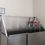 Experience the convenience of this modern pet washing station, perfect for your furry friends.