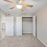 Experience comfort in this cozy bedroom featuring modern amenities.